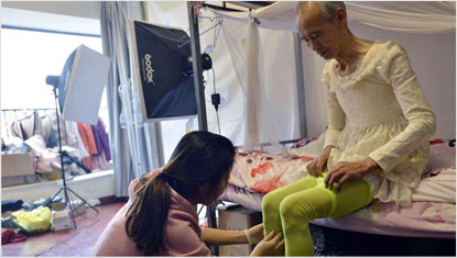 Being helped into a pair of tights by a Chinese bird